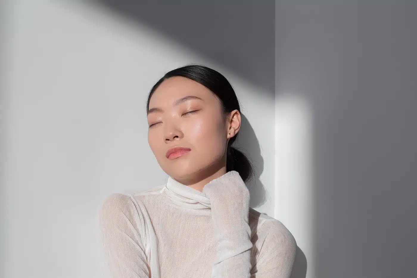 Beautiful asian woman posing with perfect skin