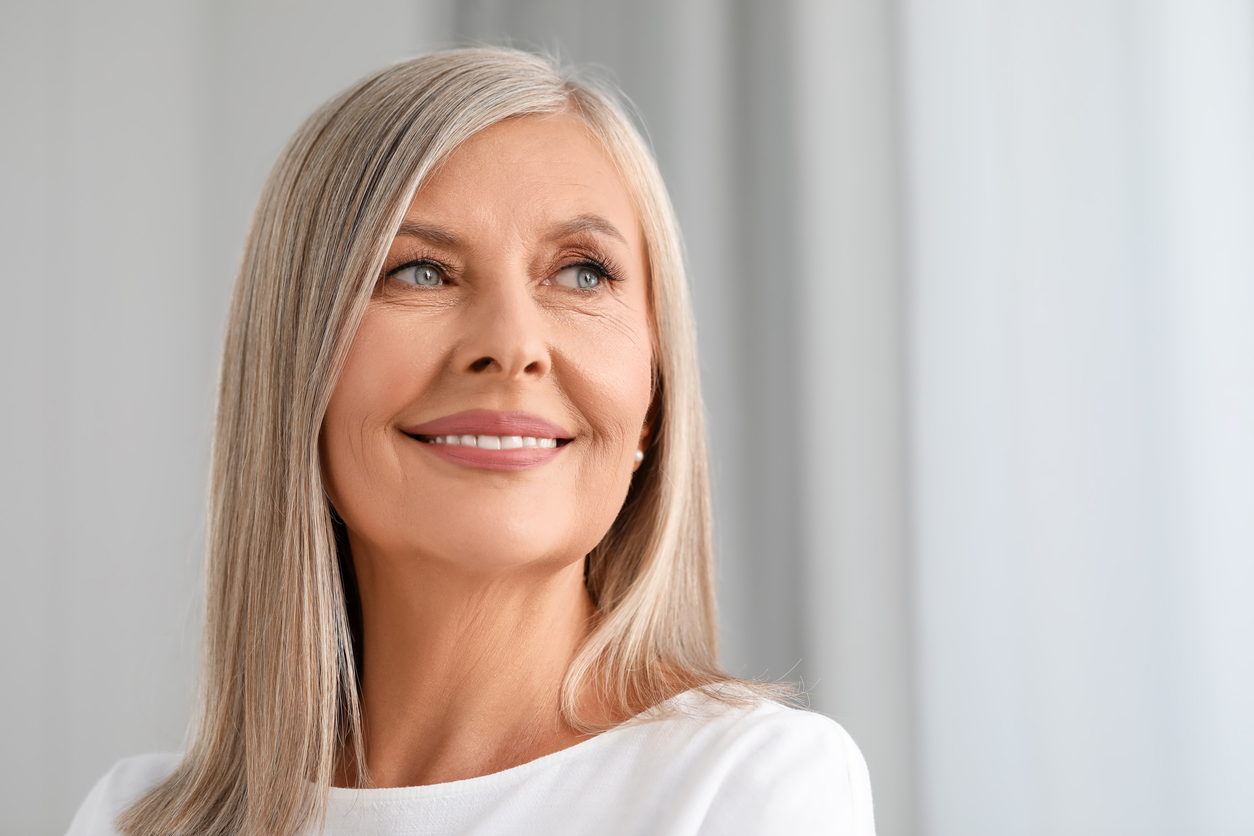 Middle-aged woman with healthy skin for Sculptra treatment content