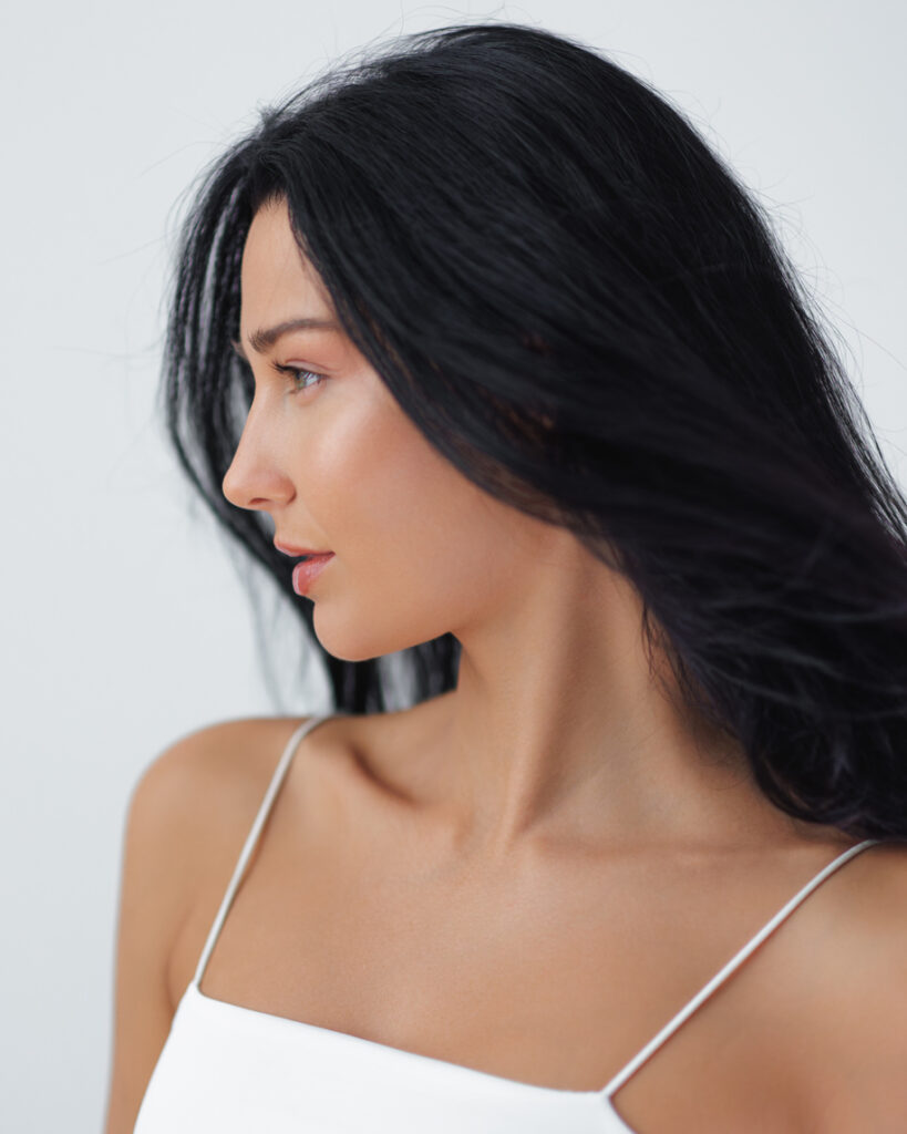 Woman in profile with smooth skin for Dysport facial aesthetics content
